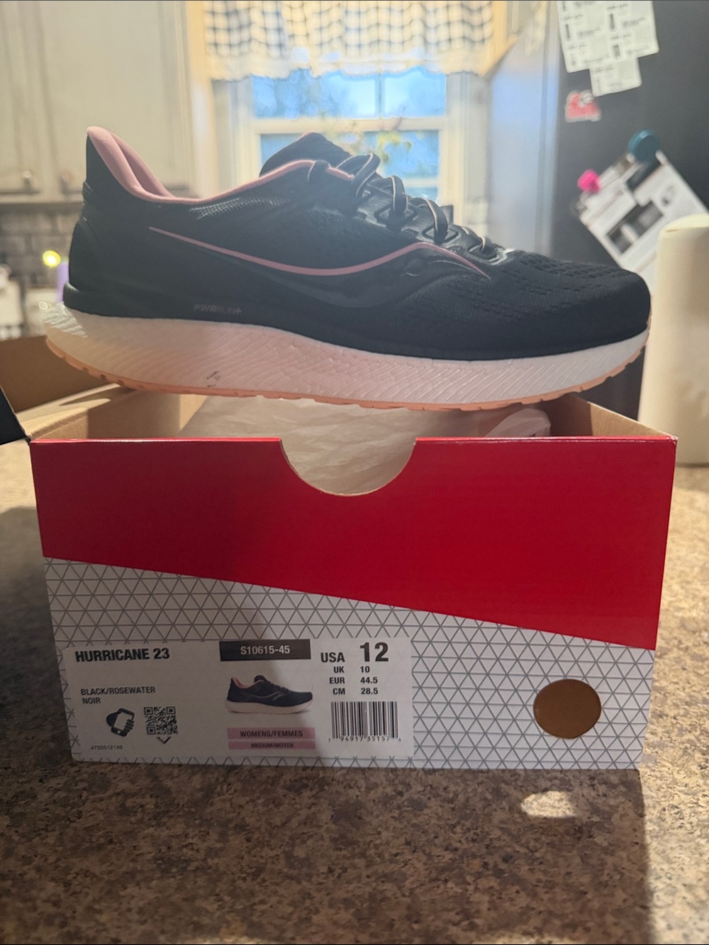 Saucony Hurricane 23 Black Running Shoe with Pink Accents